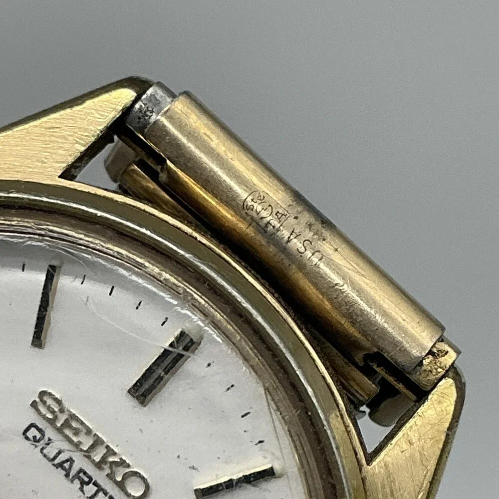 Vintage Seiko Mens Watch 34mm Gold Tone Stretch Band Date 8222-7009 New Battery